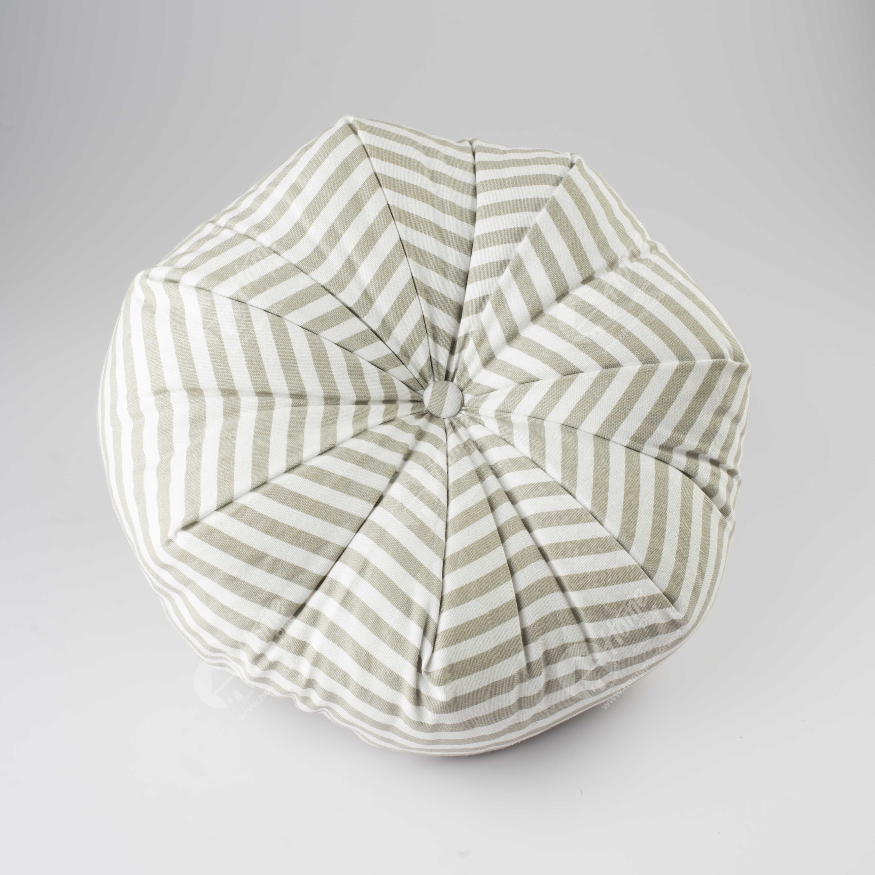 A round octagon cushion with thin stripes in beige and black colors, displayed against a white background.